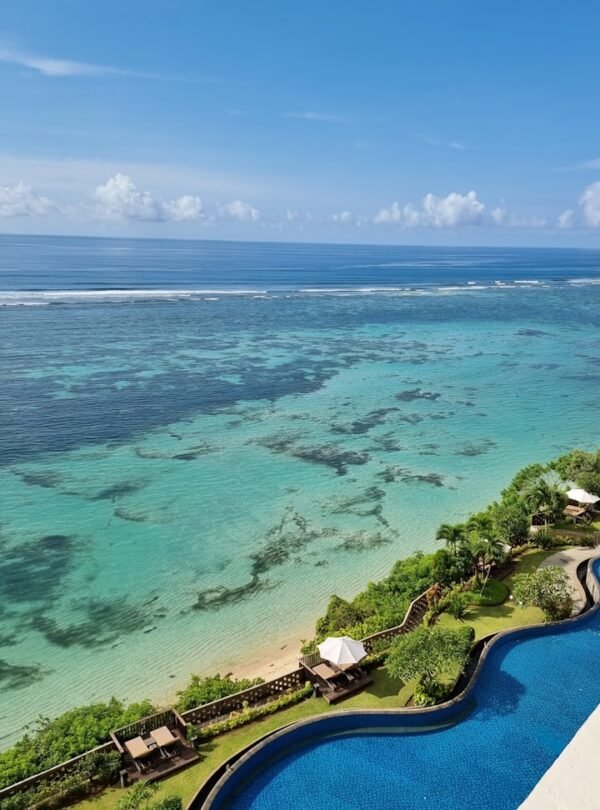 a view of the ocean from the top of a building